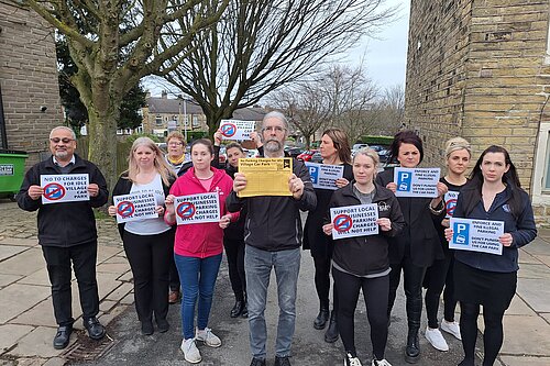 Idle Businesses and Councillors at the village car park protesting the introduction of charges 