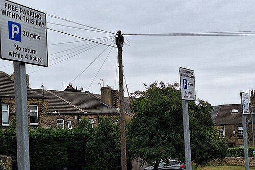 Signs for free parking bays in Idle Capark Free parking bays